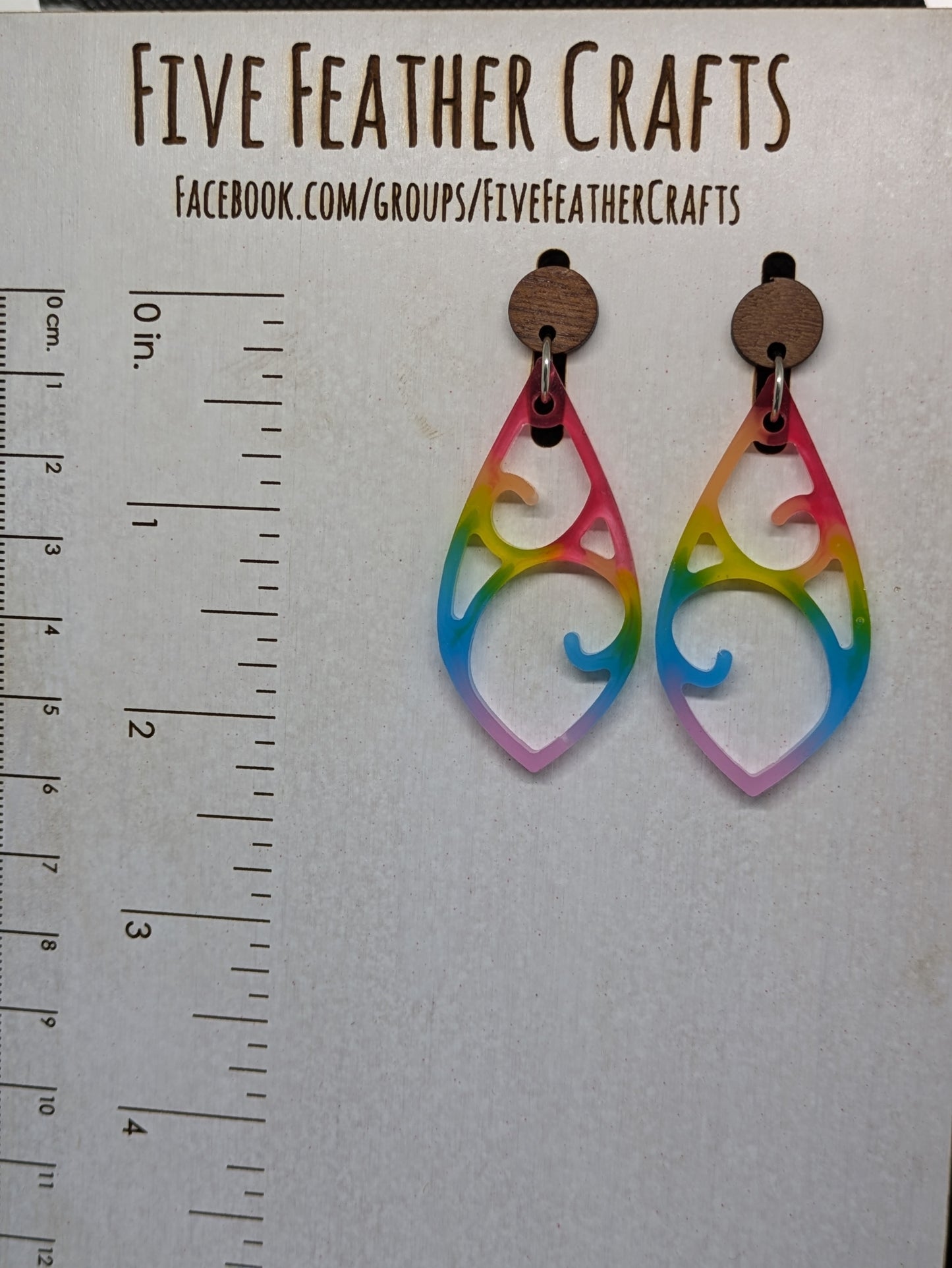 Rainbow colored resin stud dangles